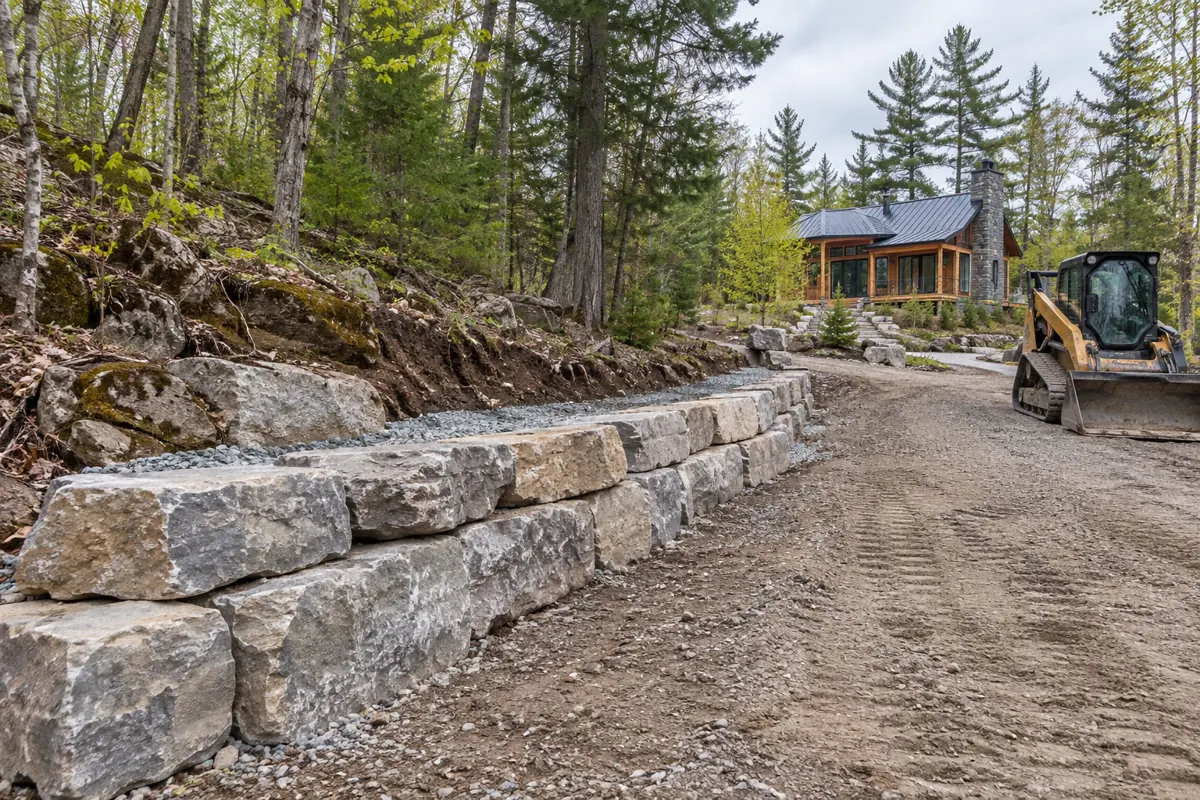 AI concept illustration: retaining wall work on a wooded rural cottage property